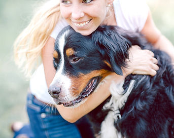 Woman Hugging Dog